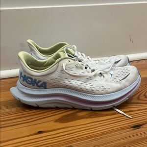 Hoka Women’s White Running Shoes with Light Blue Logo and Pale Yellow Lining